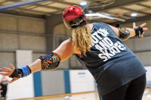 Skater Kitty SlamHer in a "Shut up and skate" tank top